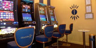 Live casino dealer table with cards and chips on taya365 pro